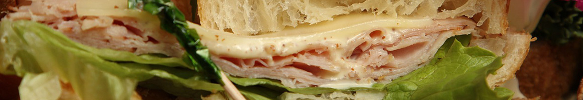 Eating American (New) Deli Sandwich at Village Cafe restaurant in Centreville, VA.